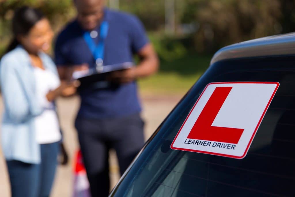 Car windscreen with L plate