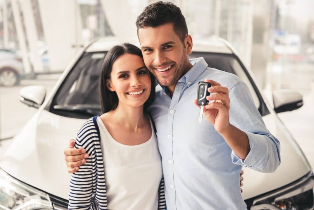 Couple buying a car