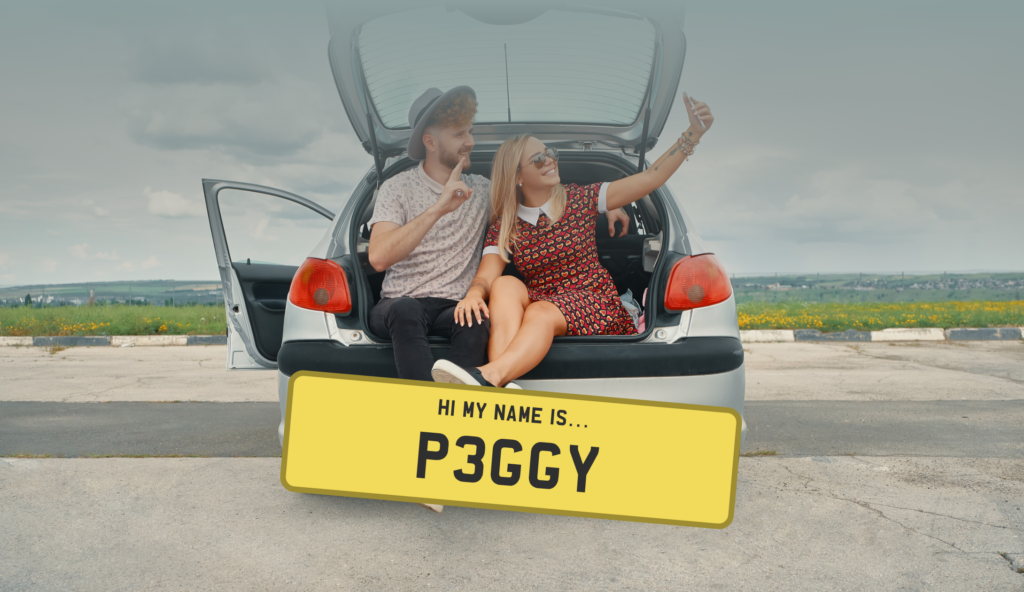 A couple in the boot of a car celebrating Name Your Car Day