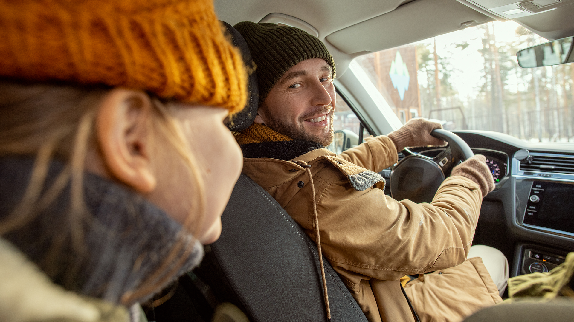 Car driver talking to passenger