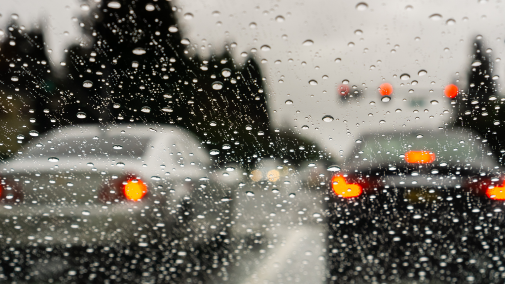 Cars stuck in traffic in rain